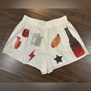 NWT Queen of Sparkles Red and Black Icon Shorts in White. Size M